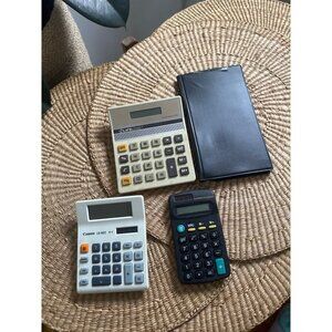 4 vintage Calculators